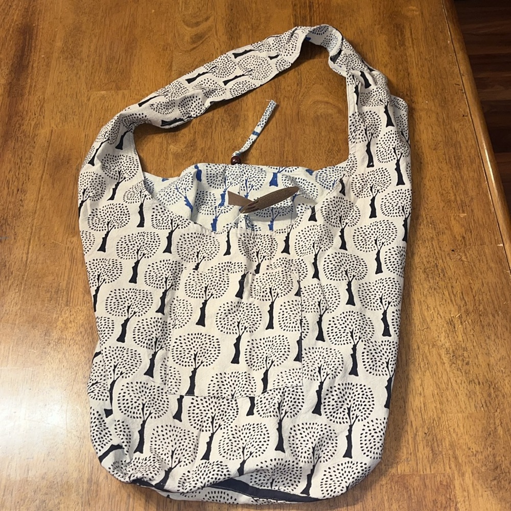 New Tree Sesign reversible blue/ black Veggie Dry long  sling bag